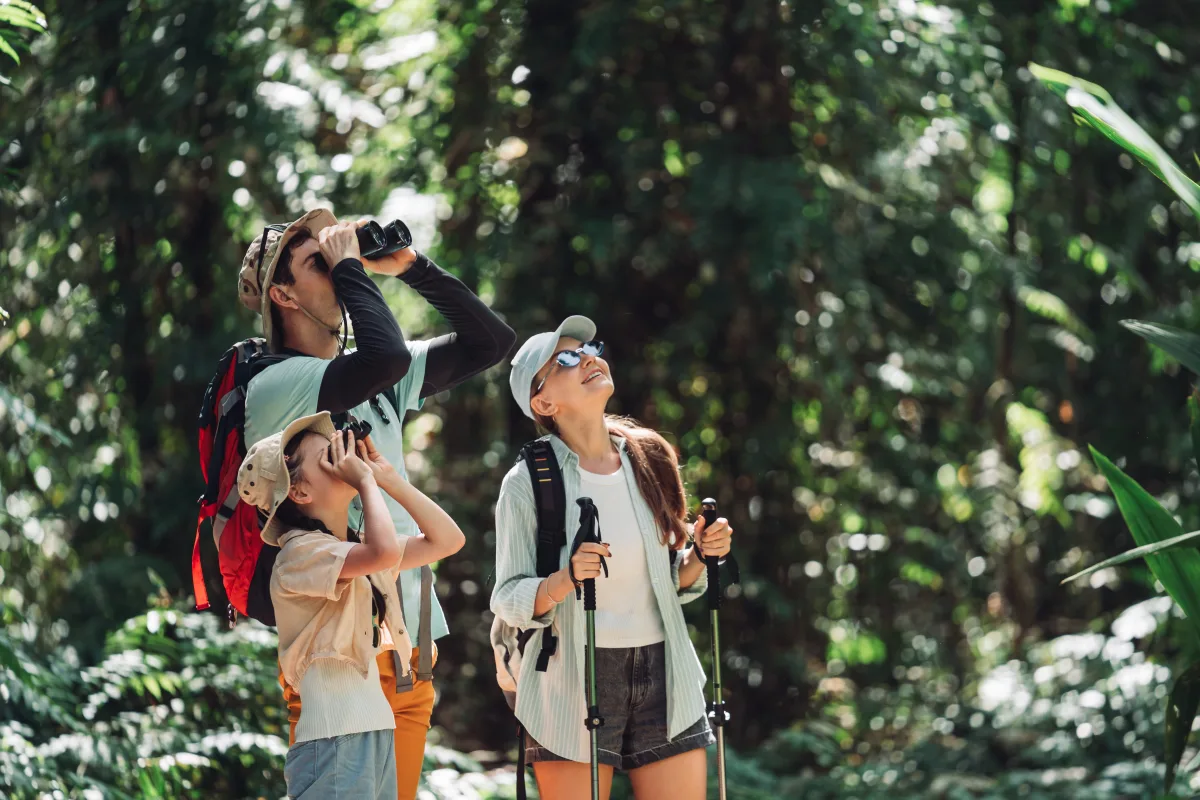 Guide with tablet checking in hikers
